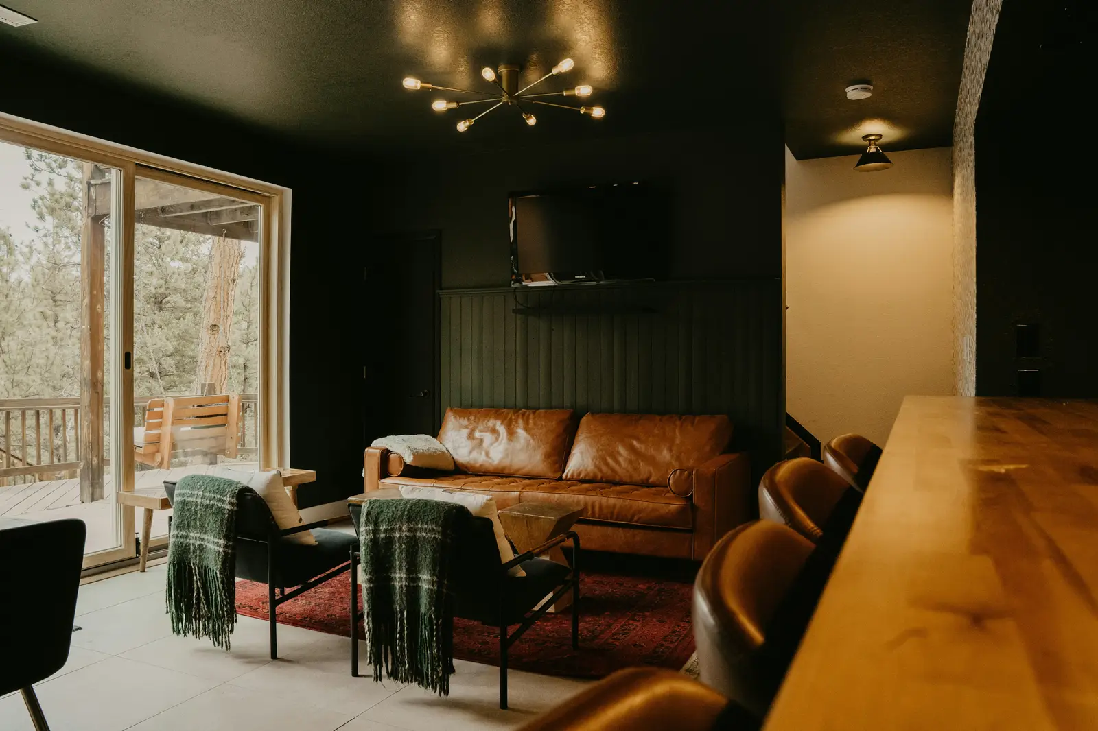 Residential cleaning service team working inside a well-lit home in Heber Utah
