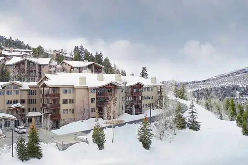 Snowy mountainside condominiums near Peoa, Utah, maintained by professional house cleaners